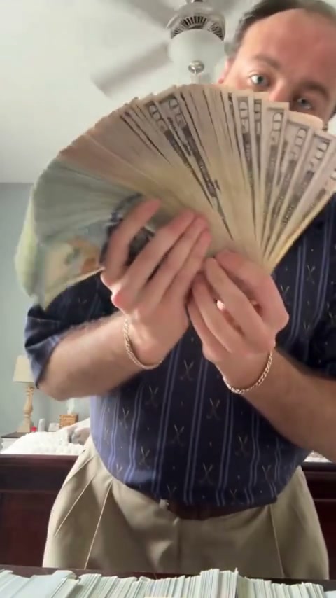 Community example in a navy shirt holding the source stacks